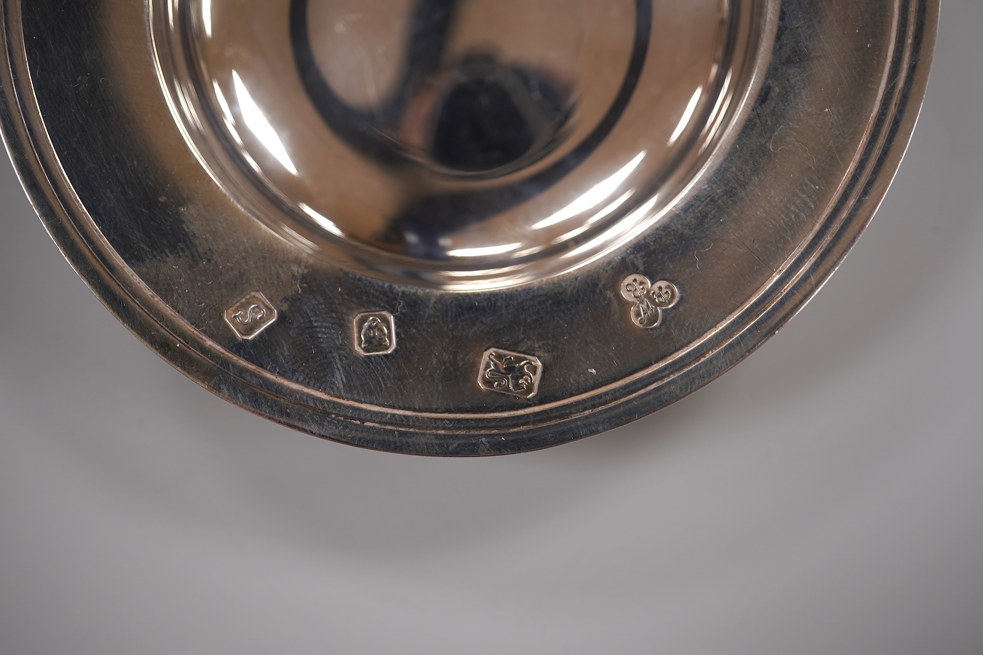 A pair of Edwardian pierced silver bonbon dishes, William Neale Ltd, Birmingham, 1907, diameter 10.2cm, together with a `1970's small silver armada dish, 5.2oz.